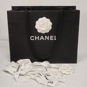 Black CHANEL Paper Gift Bag and 2 White Camelia Ribbon Flowers